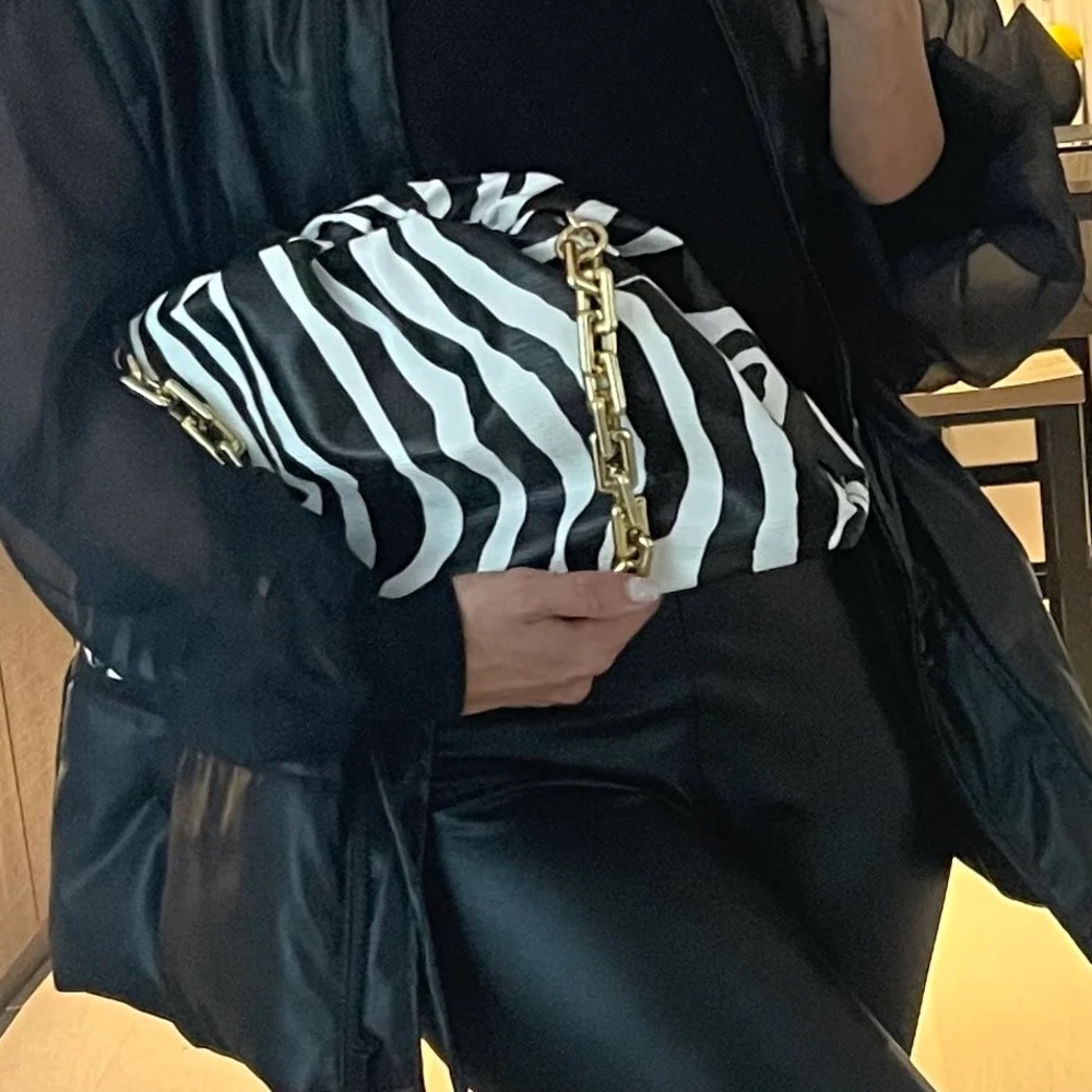 Dylan Zebra print dumpling clutch